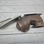 EXHAUST ELBOW WITH THROTLE